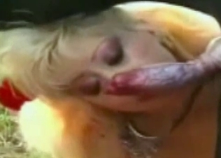 Blonde sucking off a hot dog