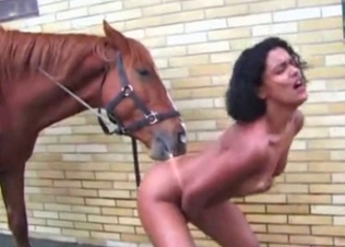 Horse gets to eat her ass